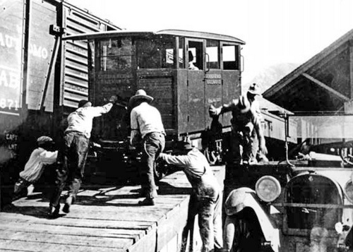 Eureka-Nevada car No. 22 being unloaded at the Southern Pacific station in Palisade, June 1927. (Photo acquired by Dale Darney from the son of Charles Sexton)